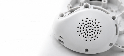 Speaker opening design for injection molded AI toy plastic housing