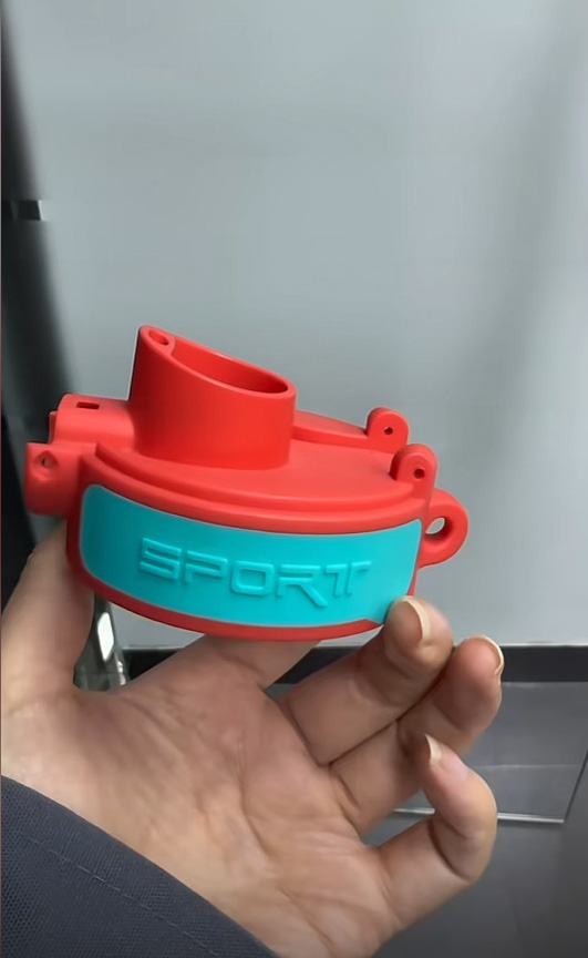 Two Shot Sports Water Bottle Cap with red PP body and blue TPE soft grip